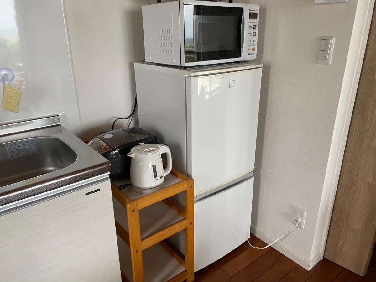 Ocean Front Sumuide Apartment Nago Exterior photo